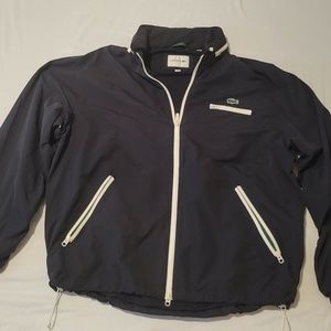 Lacoste Mens WindBreaker  Navy Blue and White Size Large with Hoodie Compartment